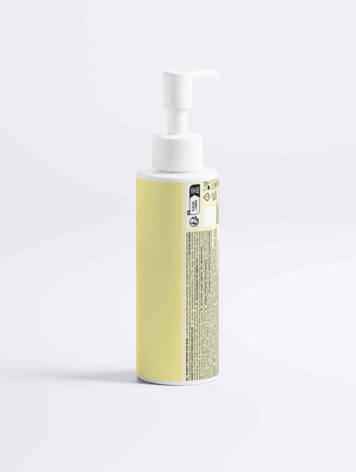 Yellow pump bottle with clean skincare label for daily face cleansing routine